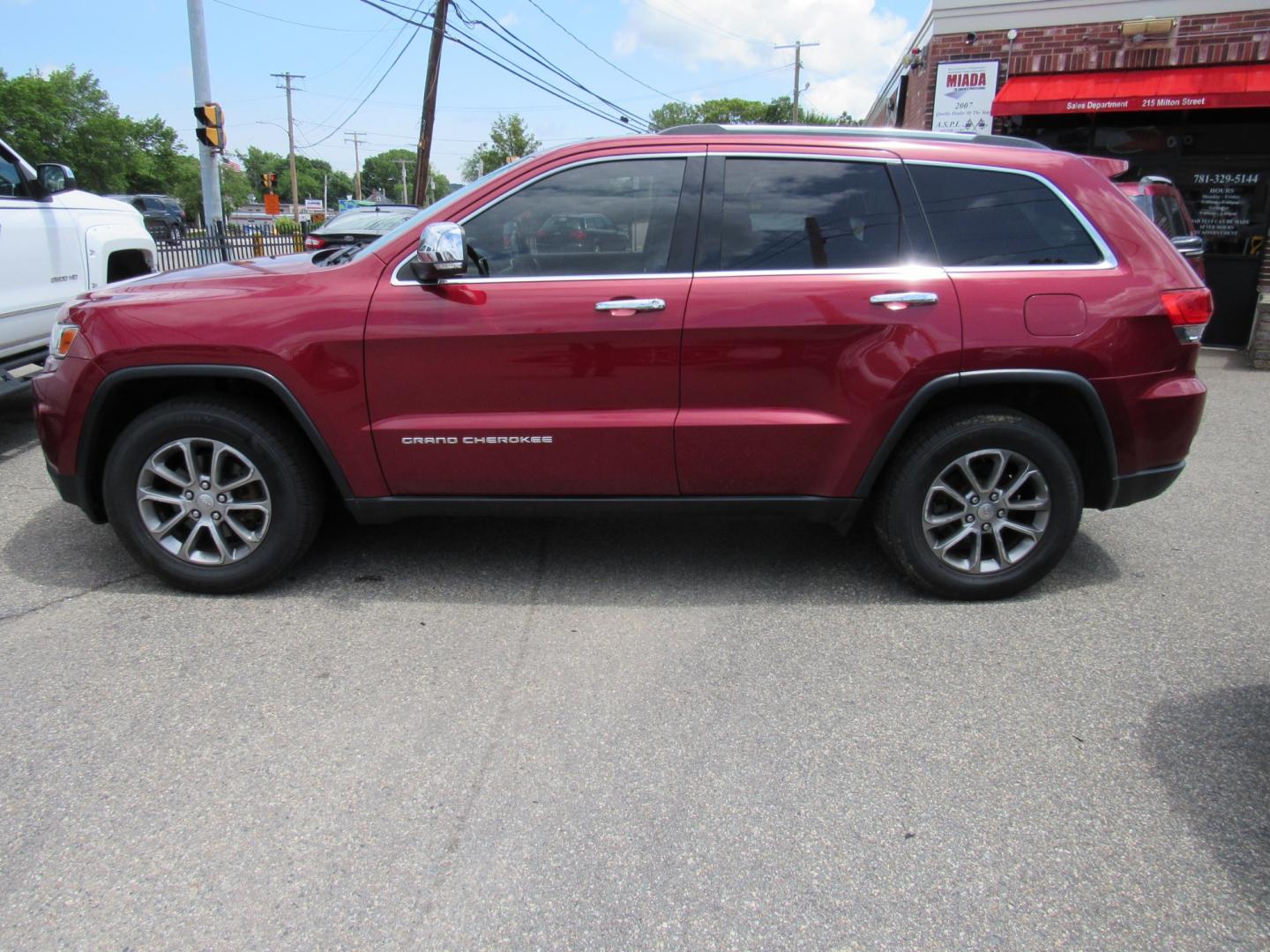 2014 Burgandy /Black Jeep Grand Cherokee Limited 4WD (1C4RJFBG7EC) with an 3.6L V6 DOHC 24V engine, 5-Speed Automatic transmission, located at 215 Milton St, Dedham, MA, 02026, (781) 329-5144, 42.241905, -71.157295 - This nice Jeep Limited is in excellent condition. Fully serviced and certified. Comes with a 3/3 nationwide warranty included in the price. Call for details. Prices on all vehicles do not include $299.95 Documentation fee, as well as Massachusetts sales tax, Registration, Title Fee and State ins - Photo#3