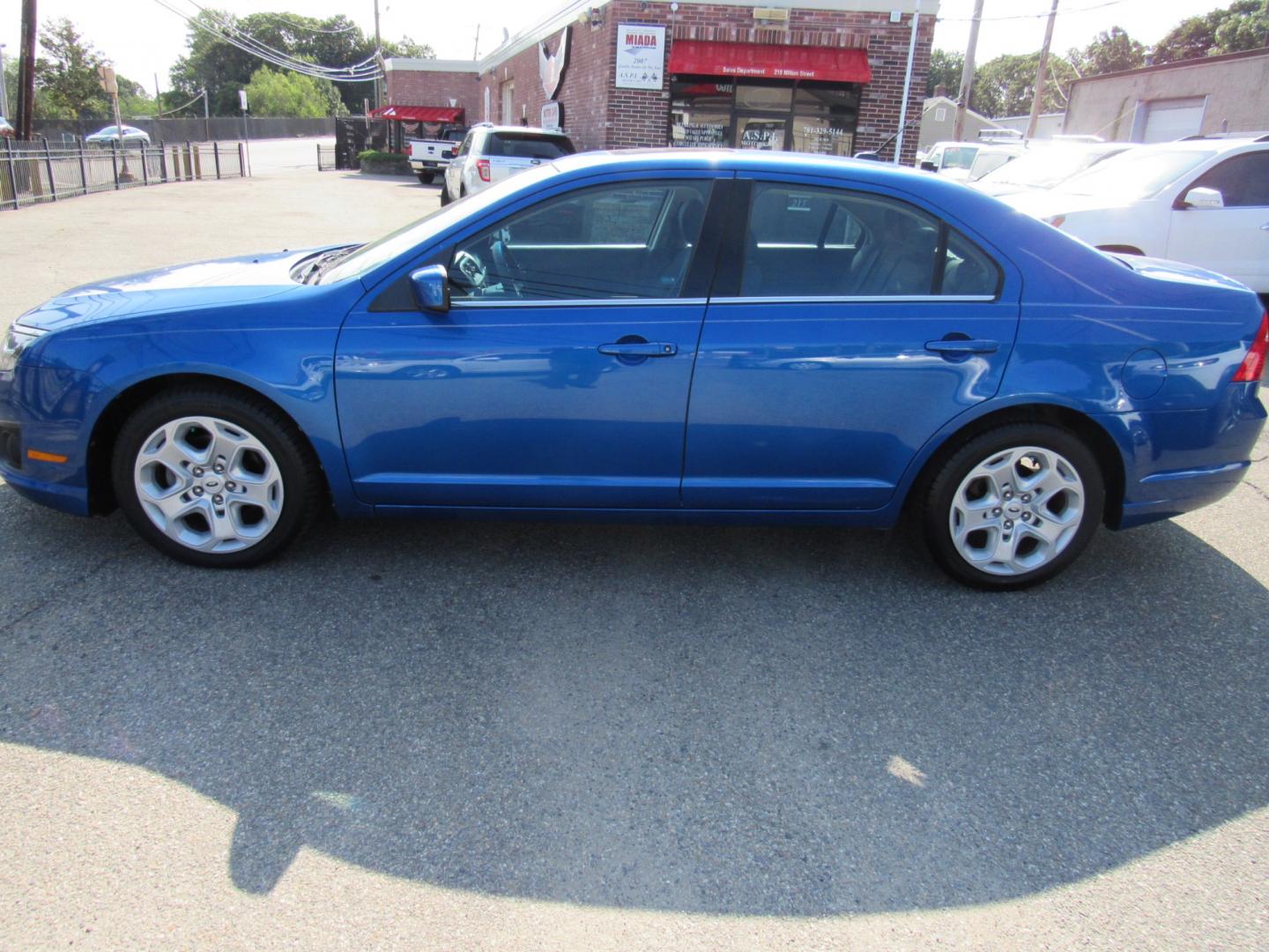 2011 Blue /Gray Ford Fusion I4 SE (3FAHP0HA4BR) with an 2.5L L4 DOHC 16V engine, Automatic transmission, located at 215 Milton St, Dedham, MA, 02026, (781) 329-5144, 42.241905, -71.157295 - This low mileage sedan is in excellent condition. Runs as good as it looks. All ASPI Motor Cars vehicles come with a 3/3 warranty included in the price. Call for details. All vehicles are serviced before they are delivered to assure the highest quality used vehicle. - Photo#3