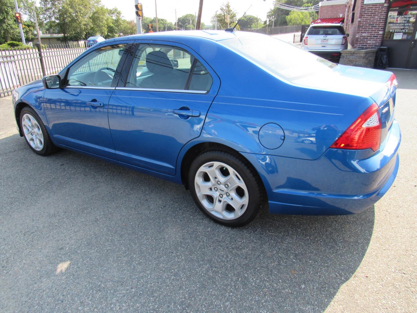 2011 Blue /Gray Ford Fusion I4 SE (3FAHP0HA4BR) with an 2.5L L4 DOHC 16V engine, Automatic transmission, located at 215 Milton St, Dedham, MA, 02026, (781) 329-5144, 42.241905, -71.157295 - This low mileage sedan is in excellent condition. Runs as good as it looks. All ASPI Motor Cars vehicles come with a 3/3 warranty included in the price. Call for details. All vehicles are serviced before they are delivered to assure the highest quality used vehicle. - Photo#4