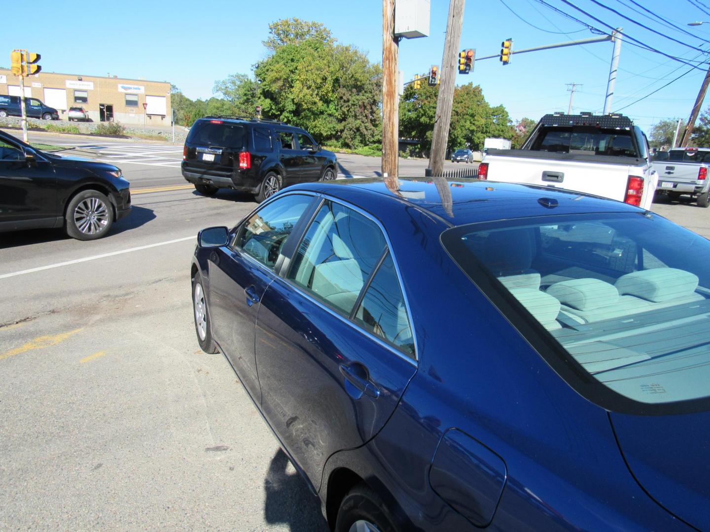 2010 Blue /Gray Toyota Camry Camry-Grade 6-Spd AT (4T4BF3EK5AR) with an 2.5L L4 DOHC 16V engine, 6-Speed Automatic Overdrive transmission, located at 215 Milton St, Dedham, MA, 02026, (781) 329-5144, 42.241905, -71.157295 - Photo#4