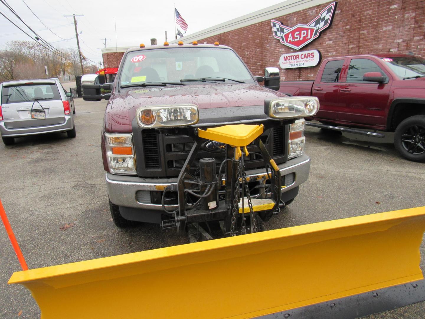 2009 Burgandy /Gray Ford F-250 SD XL 4WD (1FTNF21549E) with an 5.4L V8 SOHC 16V engine, Automatic transmission, located at 215 Milton St, Dedham, MA, 02026, (781) 329-5144, 42.241905, -71.157295 - This low mileage pick up is in excellent condition. Runs like new. Fully serviced and ready to work. Comes with an 8' Fisher plow. You will not find another one with low mileage like this one. Call today. Prices on all vehicles do not include $299.95 Documentation fee, as well as Massachusetts - Photo#1