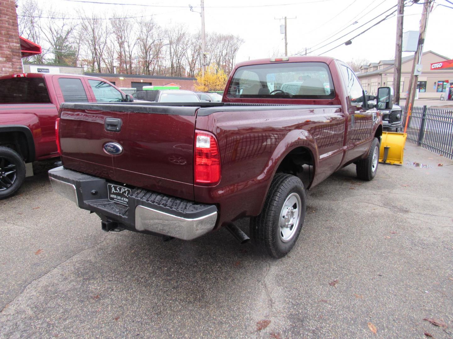 2009 Burgandy /Gray Ford F-250 SD XL 4WD (1FTNF21549E) with an 5.4L V8 SOHC 16V engine, Automatic transmission, located at 215 Milton St, Dedham, MA, 02026, (781) 329-5144, 42.241905, -71.157295 - This low mileage pick up is in excellent condition. Runs like new. Fully serviced and ready to work. Comes with an 8' Fisher plow. You will not find another one with low mileage like this one. Call today. Prices on all vehicles do not include $299.95 Documentation fee, as well as Massachusetts - Photo#7