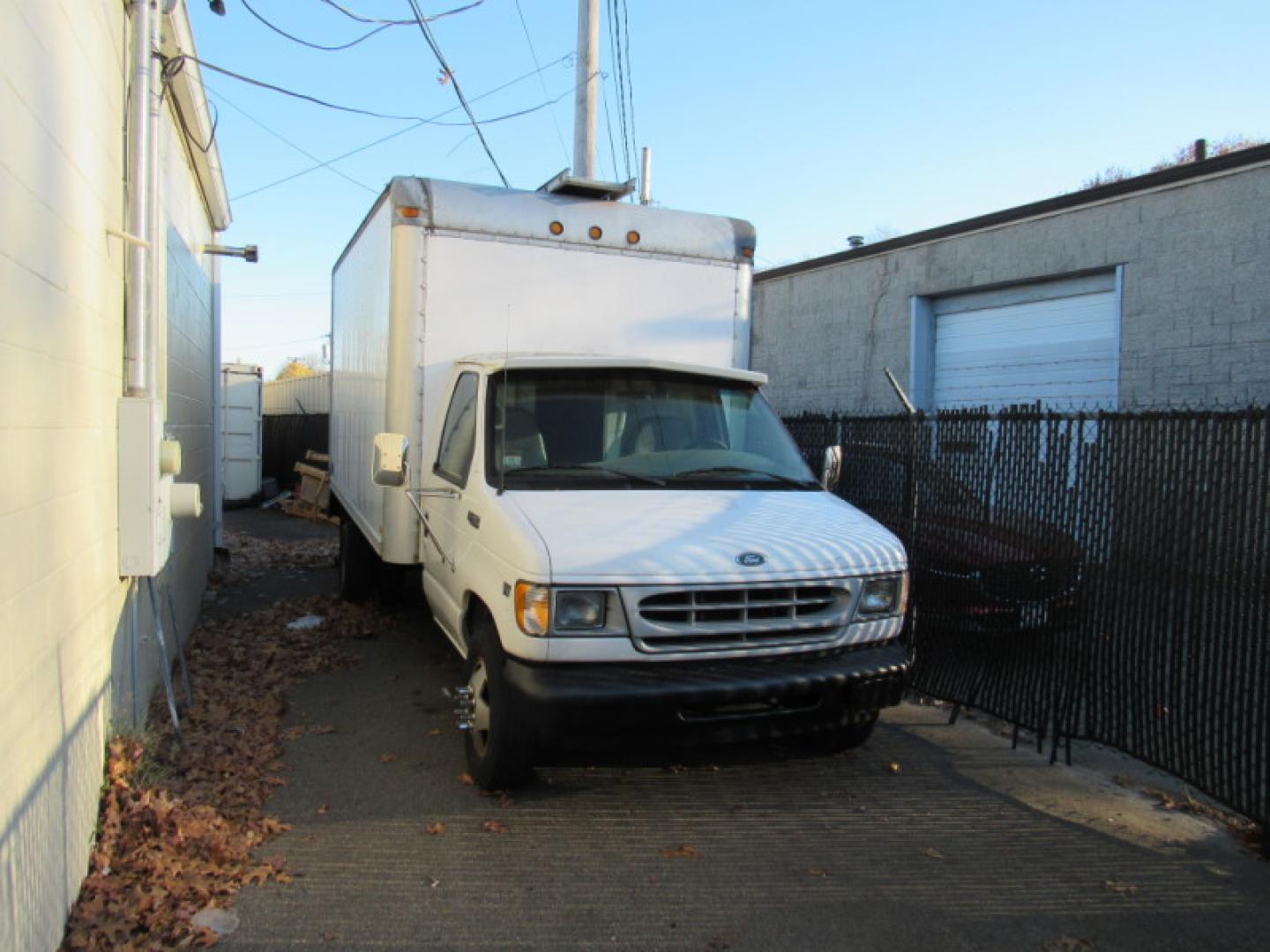 2001 White /Gray Ford Econoline E-450 Super Duty (1FDXE45F21H) with an 7.3L V8 OHV 16V TURBO DIESEL engine, Automatic transmission, located at 215 Milton St, Dedham, MA, 02026, (781) 329-5144, 42.241905, -71.157295 - 2001 Ford E450 14' Box truck. Body is clean for the year. Rockers have been repaired with slip on steel rockers. Truck runs great. 7.3L Deisle is hard to find with low mileage like this one. 60299 miles. All commercial vehicles are sold as-is. Prices on all vehicles do not include $299.95 Documen - Photo#0