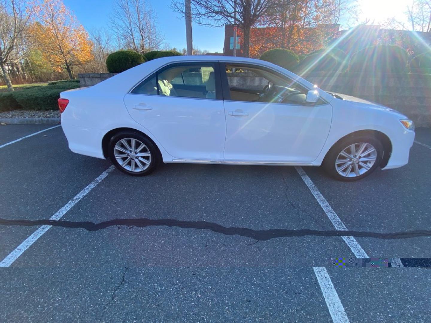 2012 White /Tan Toyota Camry XLE V6 (4T1BK1FKXCU) with an 3.5L V6 DOHC 24V engine, 6-Speed Automatic transmission, located at 215 Milton St, Dedham, MA, 02026, (781) 329-5144, 42.241905, -71.157295 - Photo#1