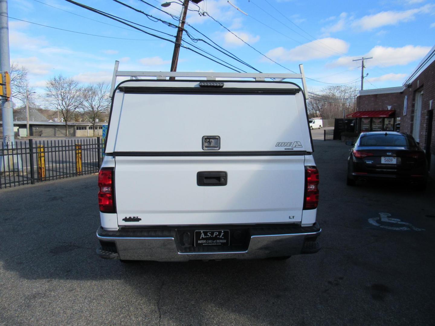 2018 White /Gray Chevrolet Silverado 1500 LT Double Cab 4WD (1GCVKREH9JZ) with an 4.3L V6 OHV 12V engine, 6A transmission, located at 215 Milton St, Dedham, MA, 02026, (781) 329-5144, 42.241905, -71.157295 - This nice work truck is in excellent condition. Comes with a utility cap and a slide out bed liner. All ASPI Motor Cars Vehicles are fully serviced before they are delivered to assure the highest quality used vehicles. Prices on all vehicles do not include $299.95 Documentation fee, as well a - Photo#5